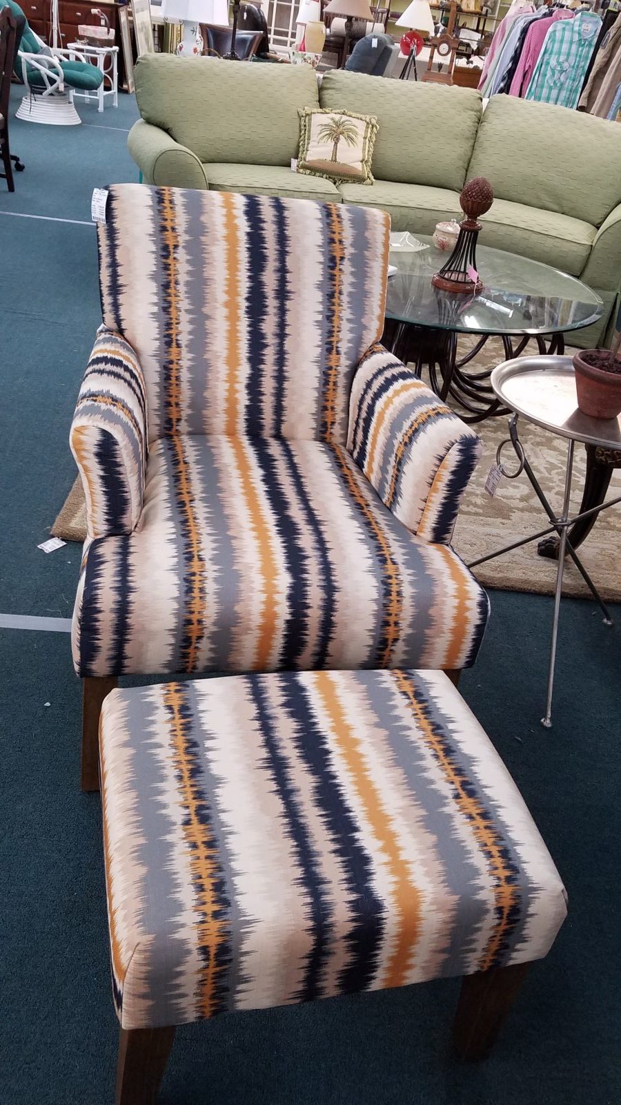 Chair and ottoman • Like new!  Pretty stripped chair and ottoman.