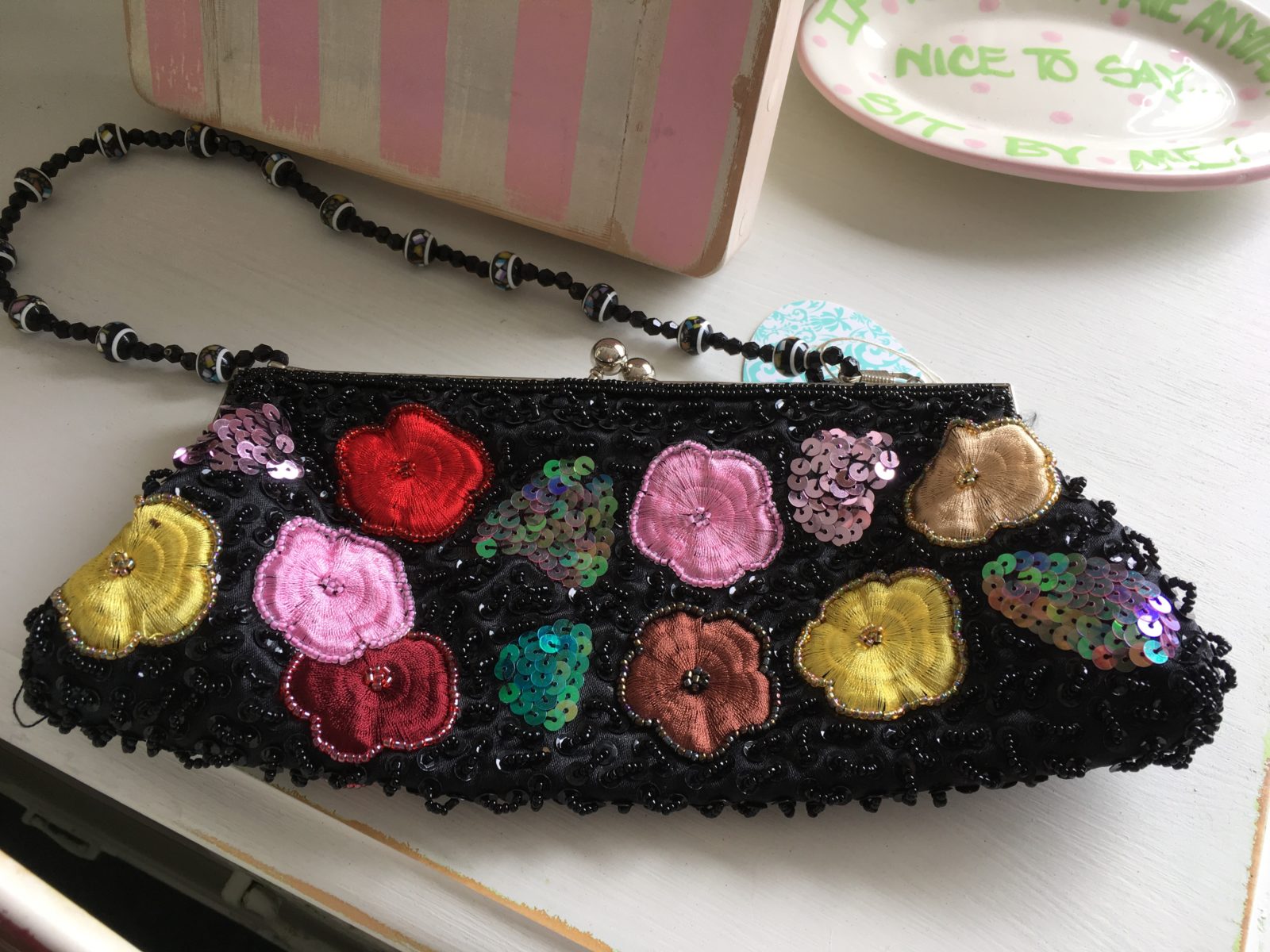 Sequined Floral Evening Bag • Unique sequined, Beaded and embroidered evening bag with a beaded strap. Wonderful gift for that special lady! She certainly won't see anyone else carrying this bag!