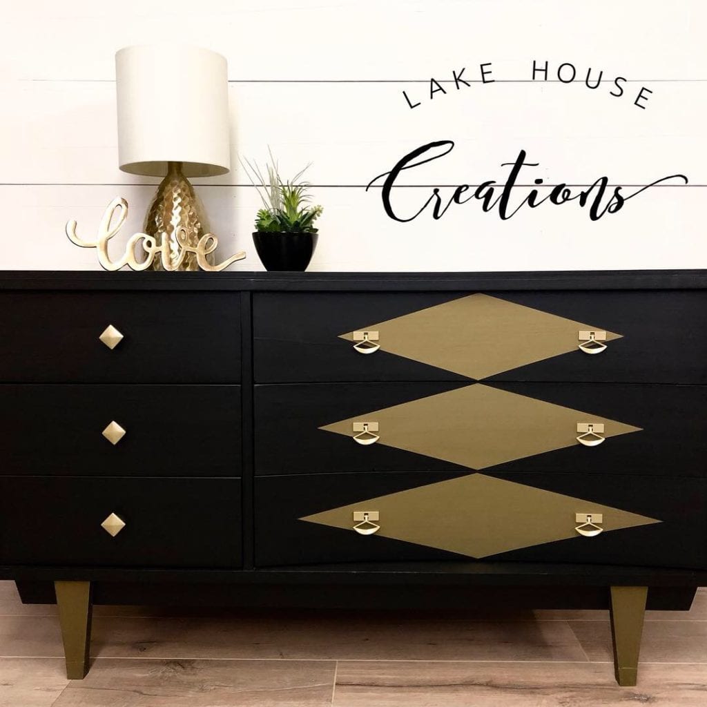 Vintage Mid Century Modern Dresser • This dresser has been refinished in Coal Black with bronze metallic accents. Large drawers feature a unique curved shape. 
Hardware has a new brushed gold finish. (W)52” x (D)18” x (H)30”
Visit us at  https://www.facebook.com/lakehousecreations2018